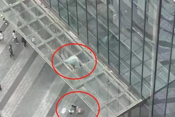 女子坠楼的背后